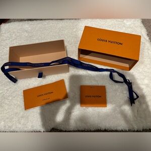 Louis Vuitton box, gift tag, ribbon, mini book